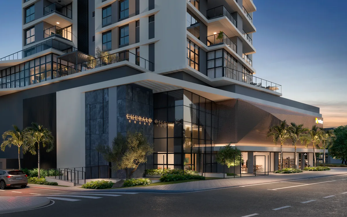 Fachada de prédio residencial moderno com detalhes em pedra e vidro - Itacolomi, Balneário Piçarras